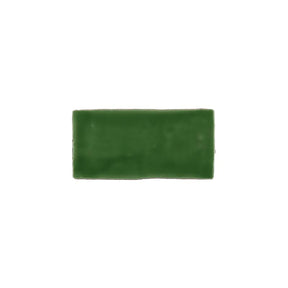 Glossy sea green ceramic subway tile with handcrafted Spanish artisan detailing