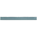 Glossy sky blue ceramic bullnose trim tile with handcrafted Spanish artisan detailing