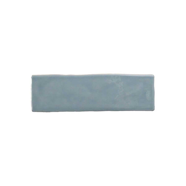 Glossy sky blue ceramic wall tile with handcrafted Spanish artisan character