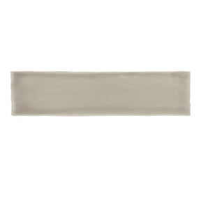 Glossy taupe ceramic subway tile with handcrafted Spanish artisan detailing