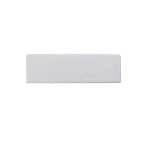 Glossy white ceramic wall tile with handcrafted Spanish artisan character