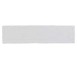 Glossy white ceramic subway tile with handcrafted Spanish artisan detailing