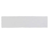 Glossy white ceramic subway tile with handcrafted Spanish artisan detailing