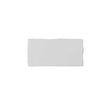 Glossy white ceramic subway tile featuring handcrafted Spanish artisan texture