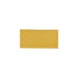 Glossy yellow ceramic subway tile with handcrafted Spanish artisan detailing