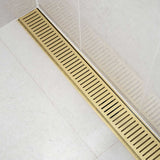 Lauxes Grates Custom Linear Shower Drain NeXT Generation - Matte Gold Install in shower floor over cream tile