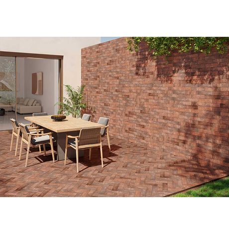 Exterior patio installation using South Loop Old Fire porcelain tile
