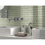 Urban Meadow Interlocking Glass Mosaic Tile Mesh Mounted Installed on wall in bathroom with 2 sink on counter top