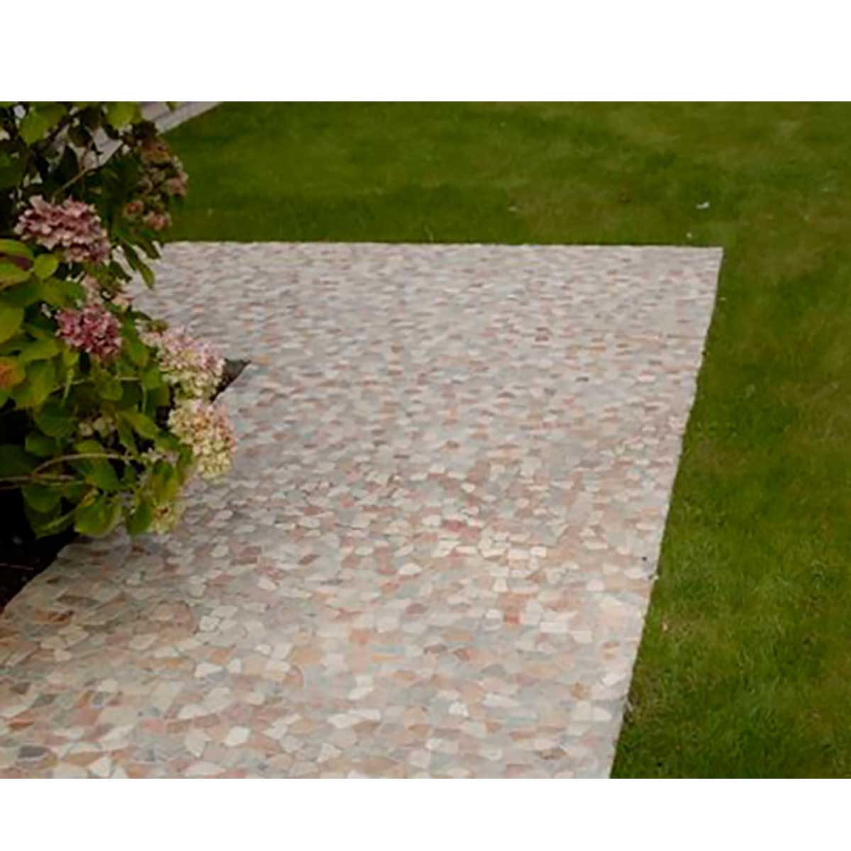 Natural pebble mosaic shower floor featuring mixed river rock and onyx