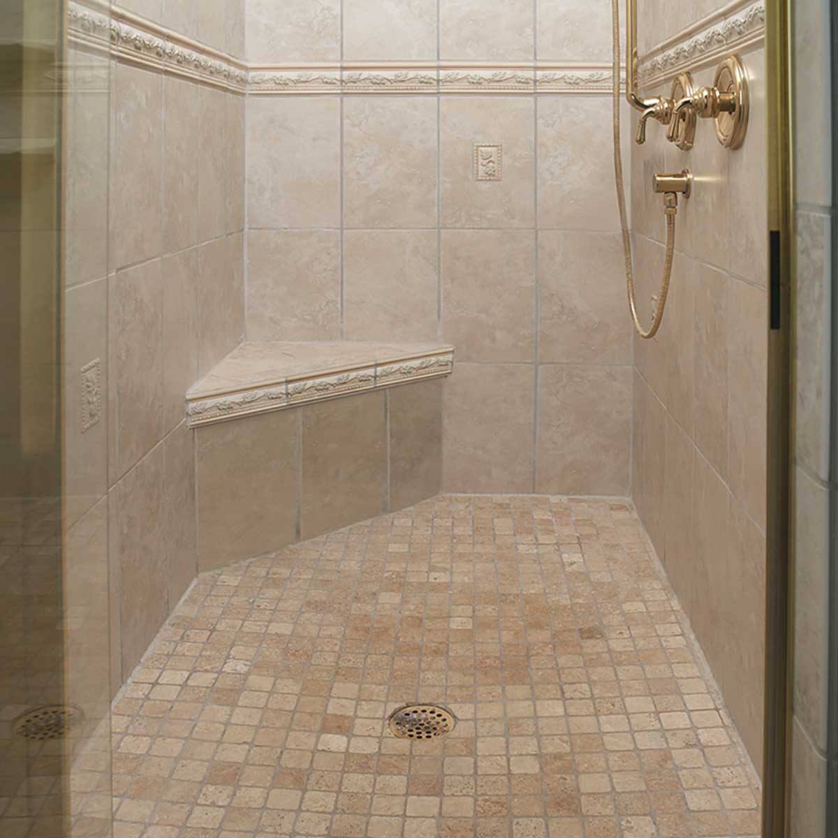 Custom tiled shower bench installation in residential bathroom remodel