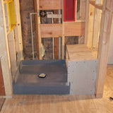 PreFormed Ready to Tile Shower Pan showing in a rough shower framed with Niches install in between the 2 x 4 studs 