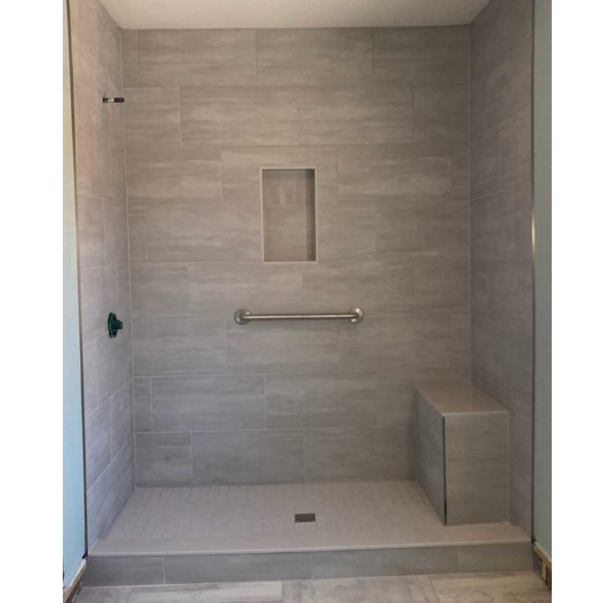 Finished tiled shower built with a ProPan waterproof shower system