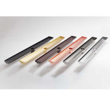 Quartz linear shower drain available in a variety of grate colors and finishes