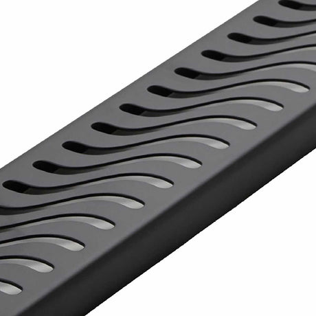 Contemporary matte black linear shower drain for tile shower installation