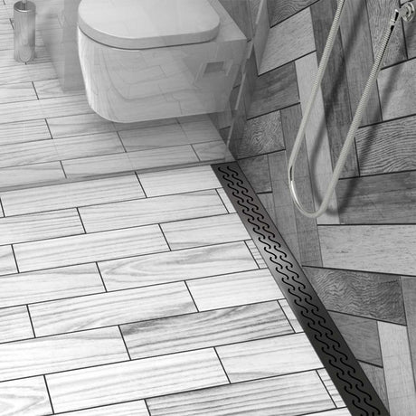 Stainless steel Hawaii shower drain with curved slot grate design