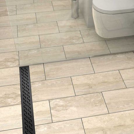Quartz Hawaii stainless steel linear shower drain with curved slot pattern