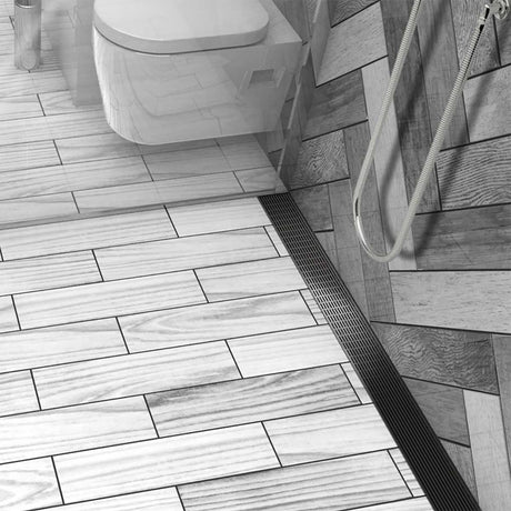 Black Nickel linear shower drain with foot-friendly wedge grate