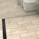 Matte Black linear shower drain with foot-friendly wedge grate