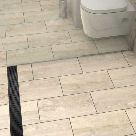 Matte Black linear shower drain with foot-friendly wedge grate