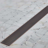 Oil-Rubbed Bronze linear shower drain for curbless bathrooms