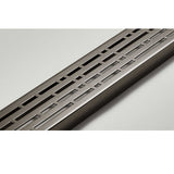 Quartz by ACO Black Nickel linear shower drain installed in contemporary walk-in shower