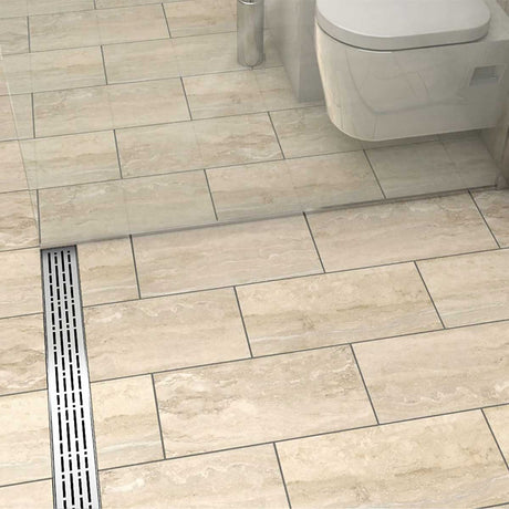 Quartz by ACO Brushed Stainless linear shower drain installed in contemporary curbless shower