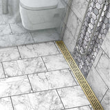 Decorative Quartz by ACO Mix Satin Brass shower drain grate for modern tile shower installations