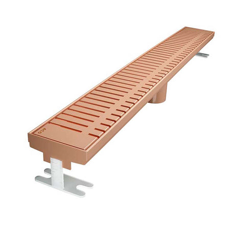 Quartz by ACO Piano linear shower drain in Rose Gold finish installed in modern luxury tile shower
