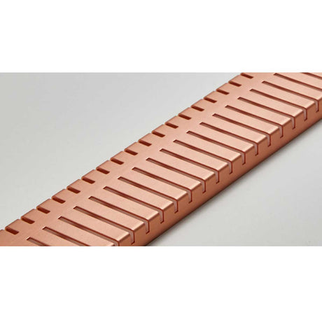 Rose Gold Piano style linear shower drain with decorative stainless steel grate for tile showers