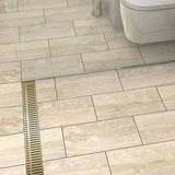 Satin Brass Piano grate linear shower drain for modern curbless shower installation