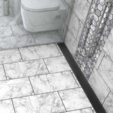 Matte Black Quadrato shower drain with geometric square grate