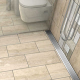 Polished Chrome Quadrato linear shower drain with geometric square grate