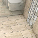 Stainless steel linear shower drain with Satin Brass tile insert grate