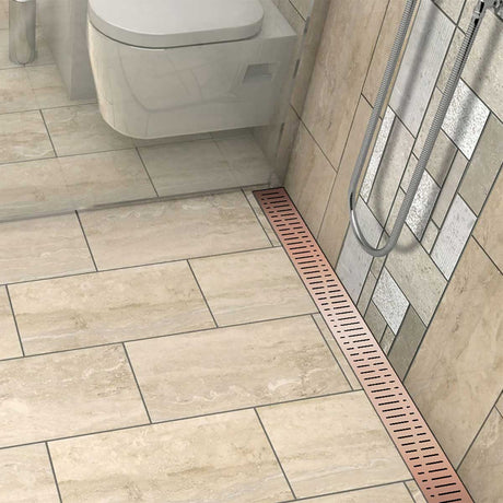 Stainless steel Quartz Wave shower drain featuring a luxurious Rose Gold finish