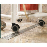 Stainless steel Wave linear shower drain installed in a luxury curbless shower