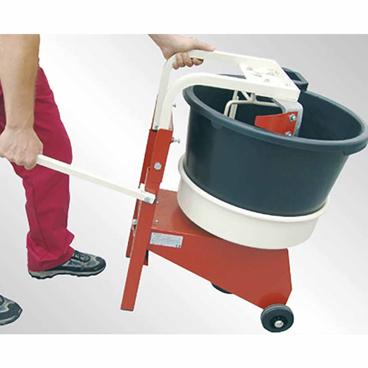 Raimondi IPERBET power mixer mixing thinset mortar on a commercial tile installation jobsite