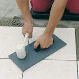 Raimondi tile beating block with grooved flat PVC base