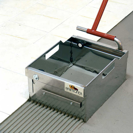 Raimondi COLOMBO thinset adhesive spreader for large format porcelain and ceramic tile installation close-up