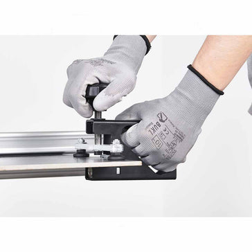 Person using Raimondi Raizor Cutting System 10 ft Scoring Guide Kit MKII Plus with gloves background