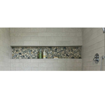 Oversized 16 x 72 shower niche in a custom tile shower