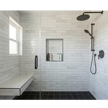 Recess-It Adjustable 16 x 36 shower niche installed in a modern tiled shower with built-in storage