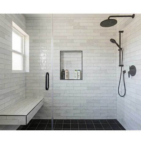 Recess-It Adjustable 16 x 36 shower niche installed in a modern tiled shower with built-in storage