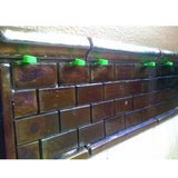 Professional Tile Spacer Wedges install in between glass tile and bullnose on a wall