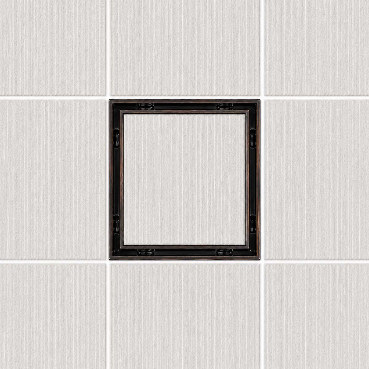 Serene Drains 5 inch square tile insert drain with ORB frame installed in a light tile surface"