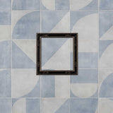 Serene Drains 5 inch square tile insert drain with ORB frame on blue and white patterned tile