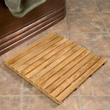 Serene teak wood mat beside freestanding bathtub
