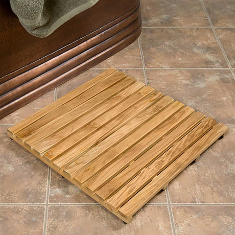 Serene teak wood mat beside freestanding bathtub
