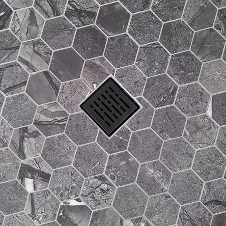 Hexagonal stone pavement with a central drain cover