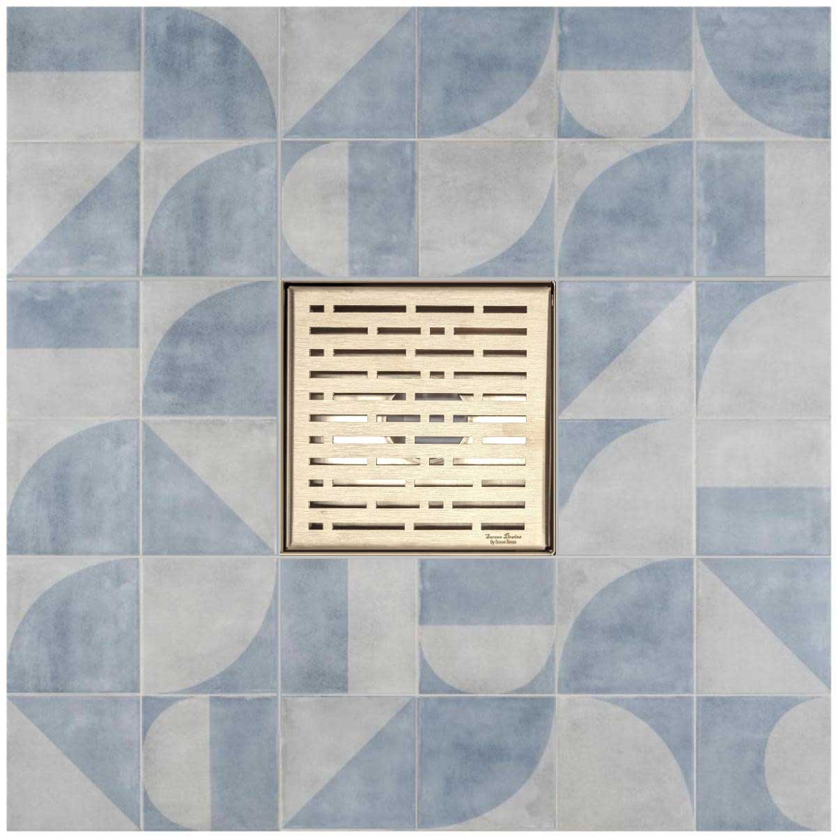 Decorative floor drain cover with geometric tile pattern