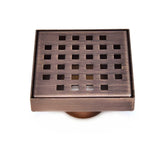 Bronze square drain cover with grid pattern on a white background